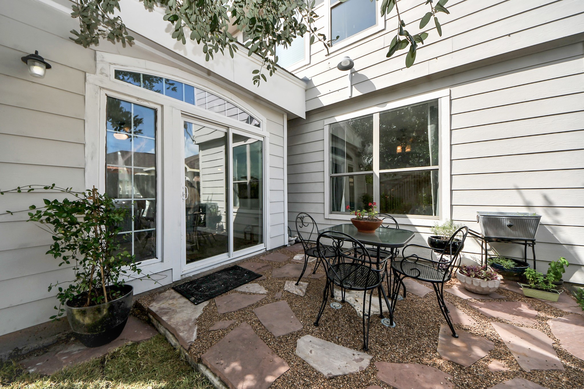 7619 Park Sage Lane Cypress, TX 77433 - Photo 48 of 48 a view of a patio with couple of chairs and potted plants