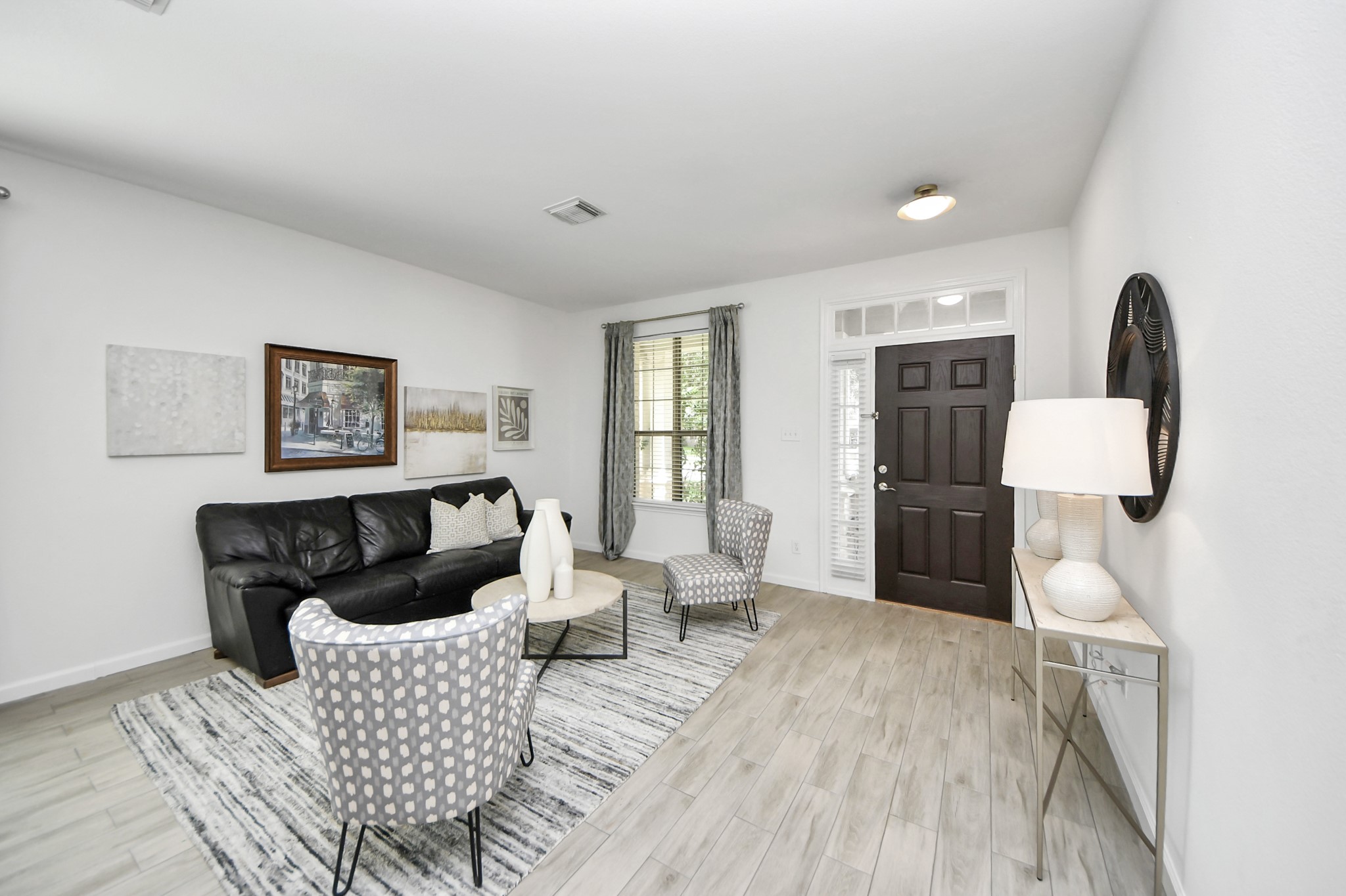 7619 Park Sage Lane Cypress, TX 77433 - Photo 7 of 48 a living room with furniture and a wooden floor