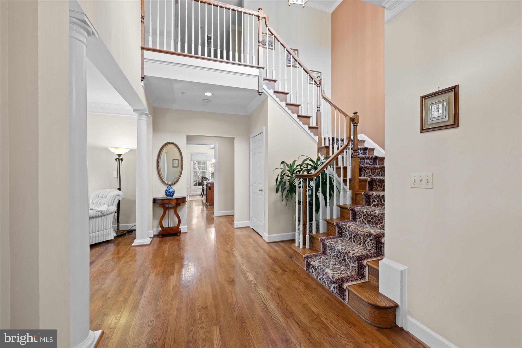 7822 Hidden Meadow Terrace Potomac, MD 20854 - Photo 5 of 29 a view of entryway and hall with wooden floor