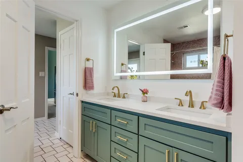 a front view of a house with a yard table and chairs