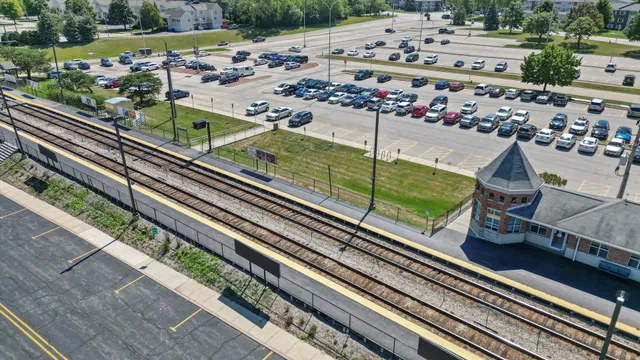 a view of a balcony with wooden floor