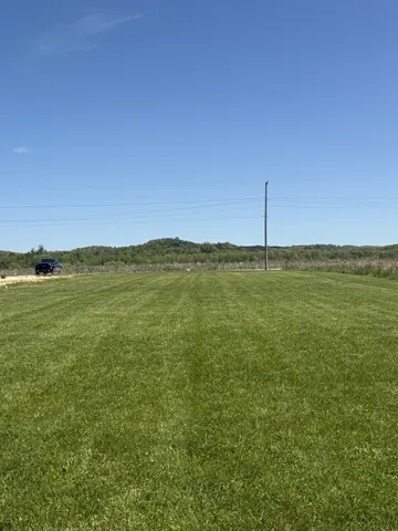 a view of outdoor space and yard