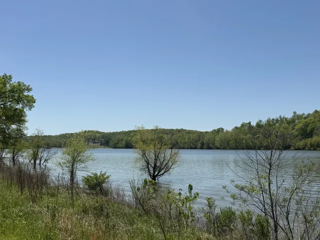 a view of lake with mountain in the background