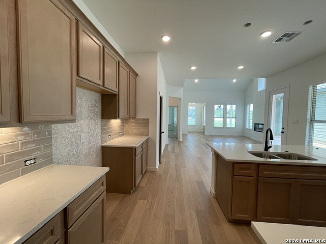 9431 Hidden Stone Schertz, TX 78154 - Photo 10 of 30 a kitchen with a sink and cabinets