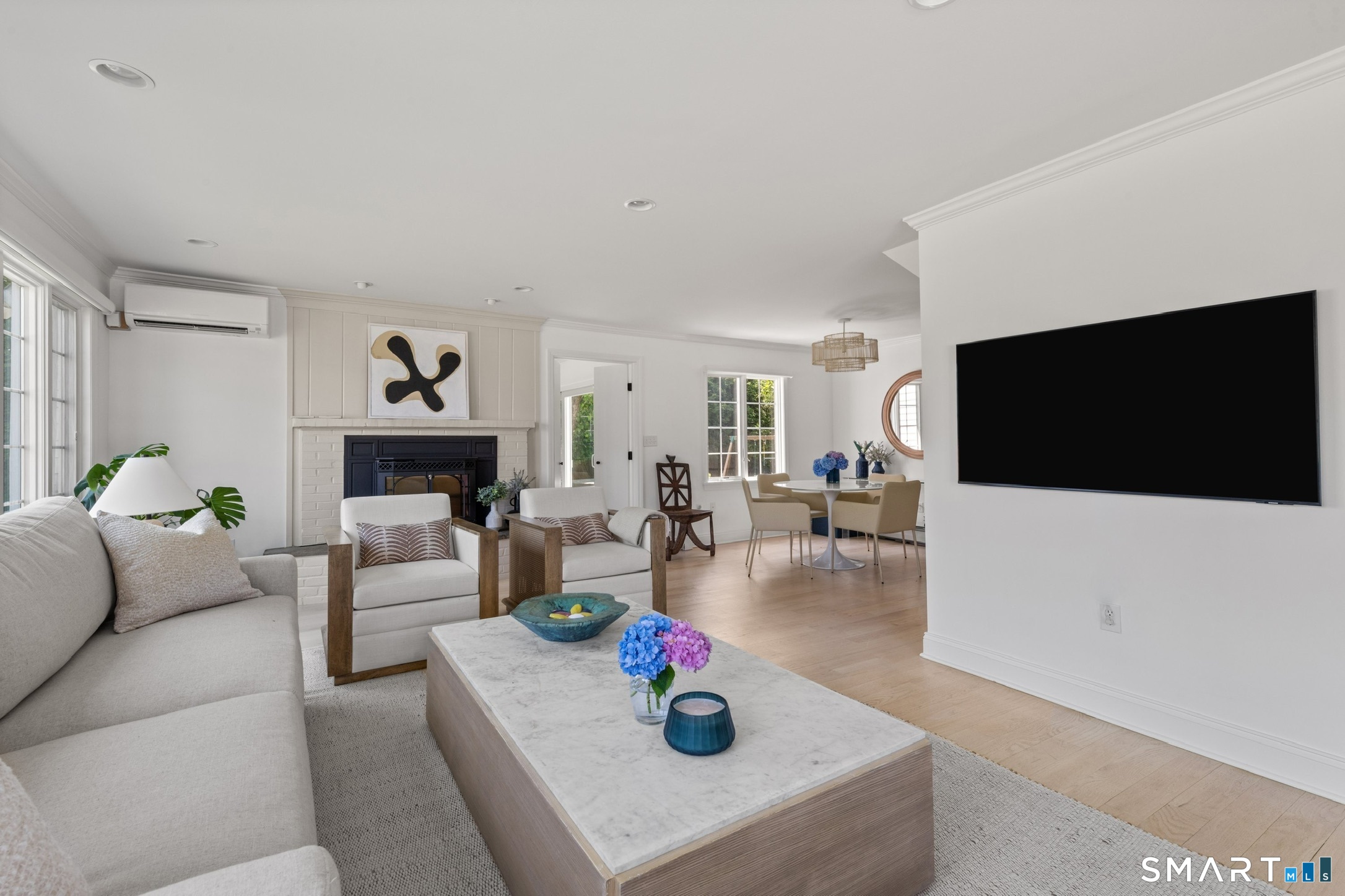 108 Harbor Road Westport, CT 06880 - Photo 10 of 25 a living room with furniture and a flat screen tv