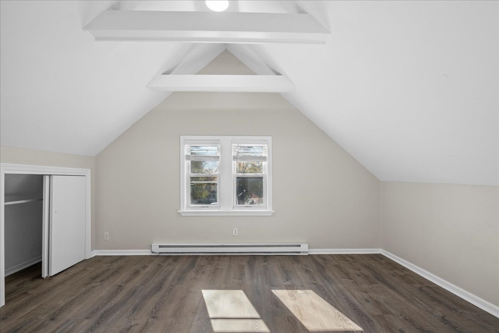 15 Clearview Avenue, Unit 3 Worcester, MA 01605 - Photo 14 of 24 an empty room with wooden floor and windows
