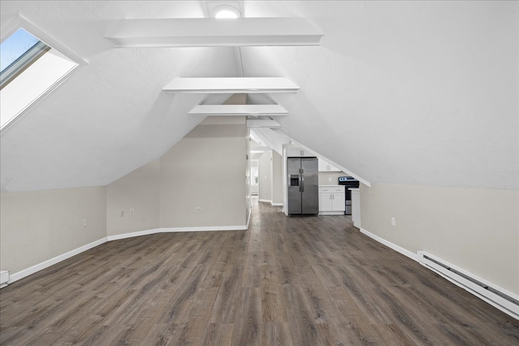 15 Clearview Avenue, Unit 3 Worcester, MA 01605 - Photo 8 of 24 a view of a hallway with wooden floor and staircase