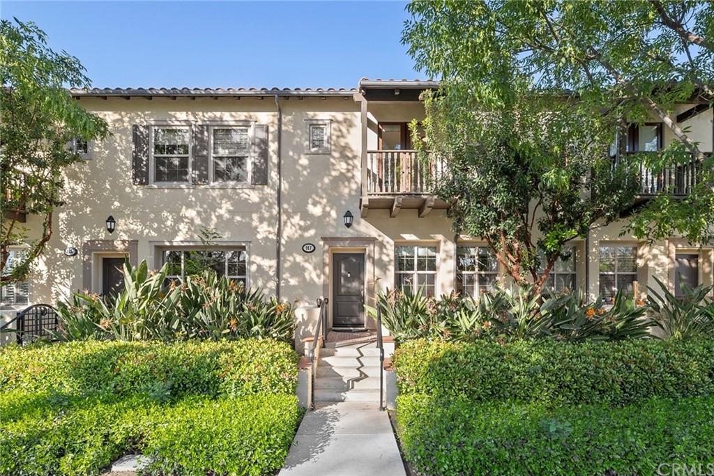107 Towngate Irvine, CA 92620 - Photo 1 of 1 a view of a building with garden