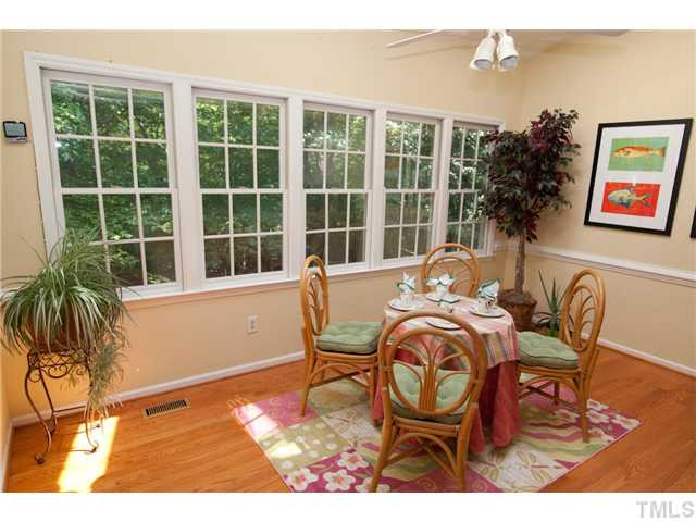 12400 Glenlivet Way Raleigh, NC 27613 - Photo 6 of 24 This Breakfast Room Area - just off the Main Kitchen - Features Lots Natural Light thought the Over-Sized Windows and the SkyLights. The Backyard Scenery is Private and Natural. What a Place to Start Your Day! Breakfast Area