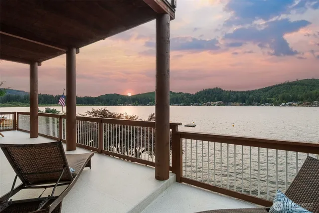 a view of a balcony with wooden floor