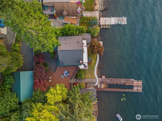 an aerial view of a house with a garden