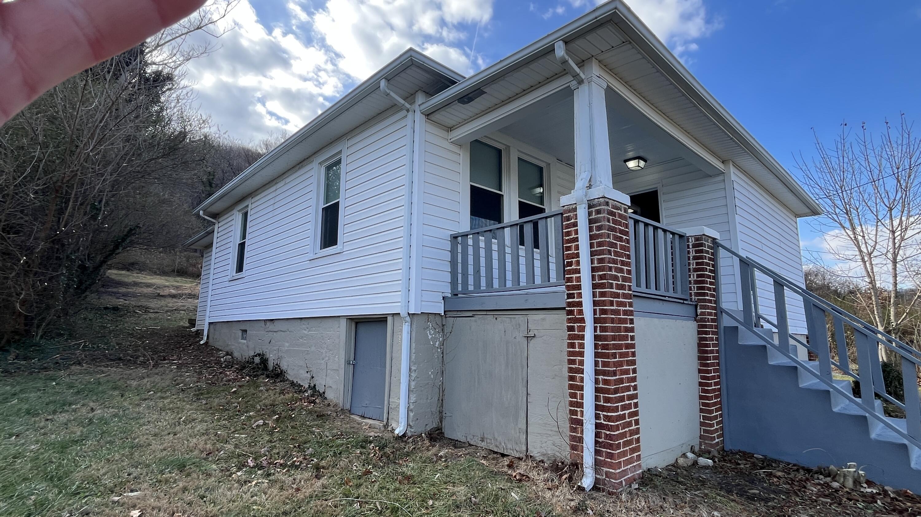 3641 Yellow Mountain Road Southeast Roanoke, VA 24014 - Photo 11 of 12 a front view of a house with garden
