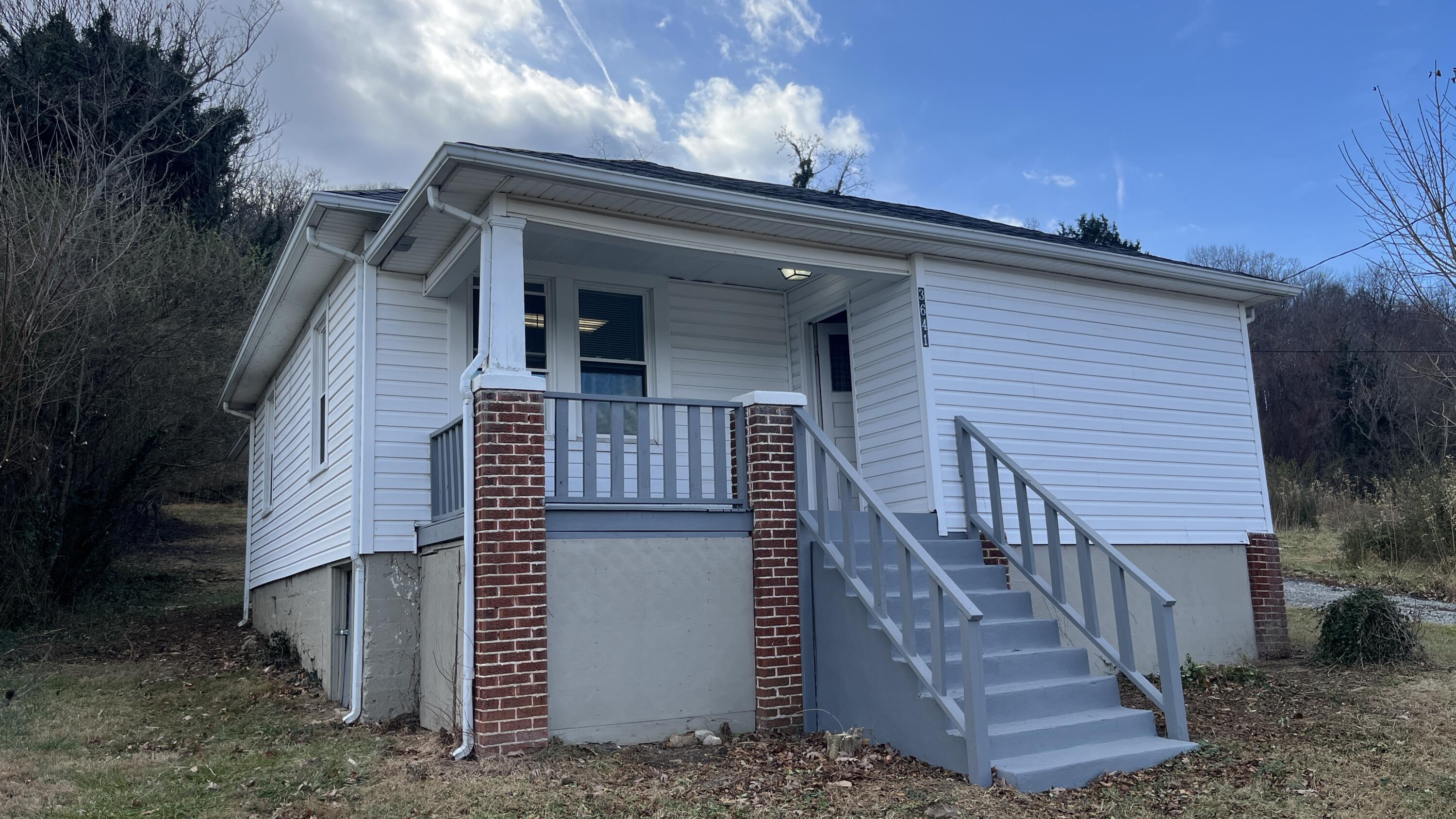 3641 Yellow Mountain Road Southeast Roanoke, VA 24014 - Photo 12 of 12 a view of a house with a small yard