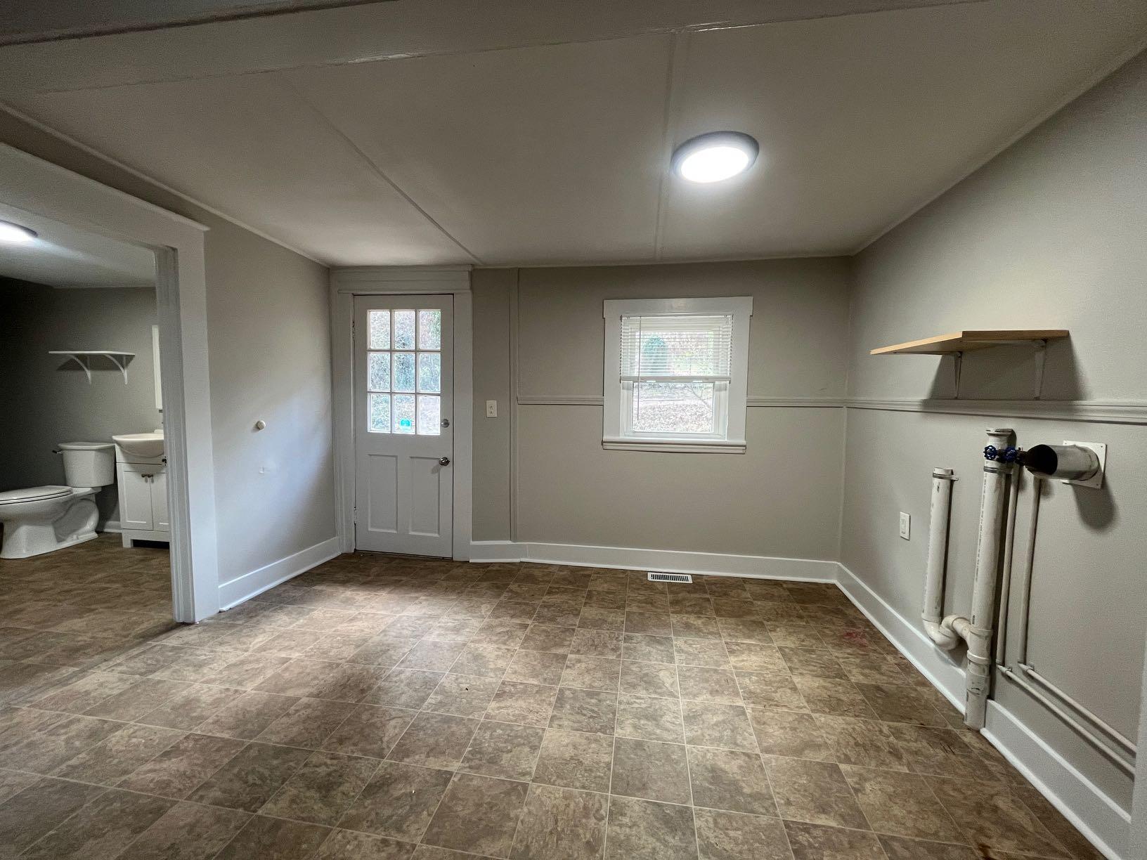 3641 Yellow Mountain Road Southeast Roanoke, VA 24014 - Photo 2 of 12 a view of an empty room with a window