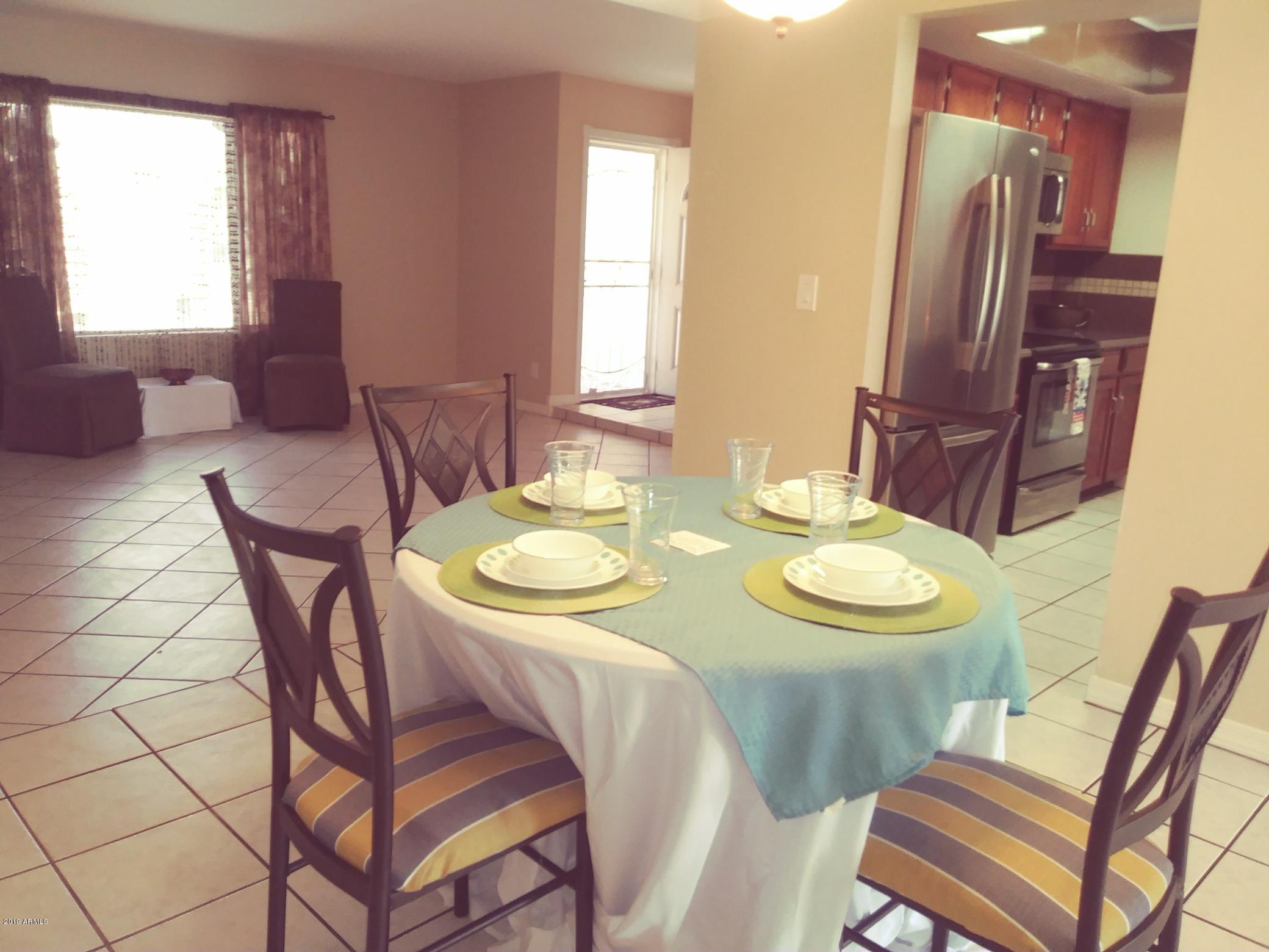 5531 West Boca Raton Road Glendale, AZ 85306 - Photo 18 of 38 dining to litchen and living