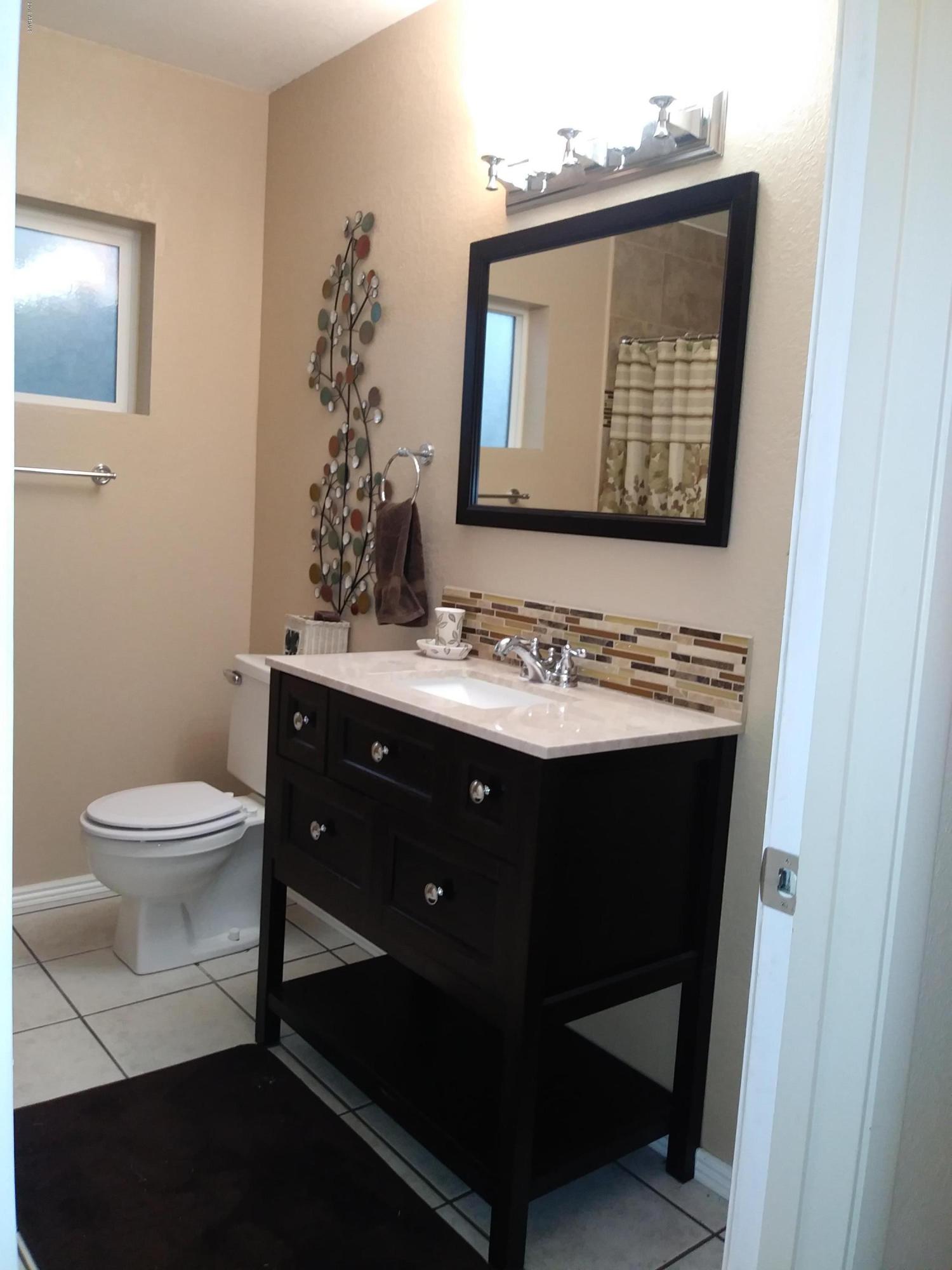5531 West Boca Raton Road Glendale, AZ 85306 - Photo 22 of 38 Guest bathroom vanity