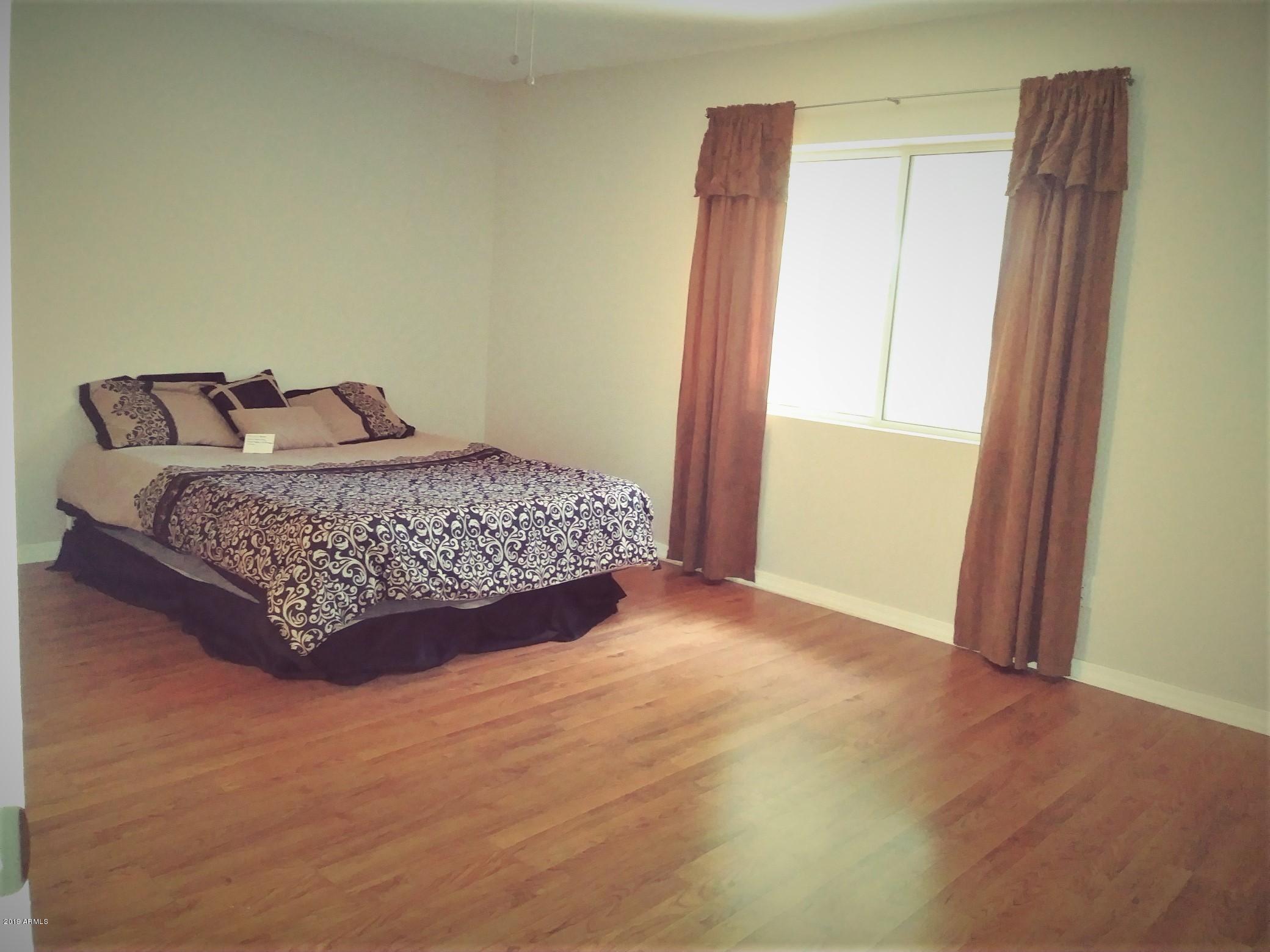 5531 West Boca Raton Road Glendale, AZ 85306 - Photo 23 of 38 master bedroom with bed