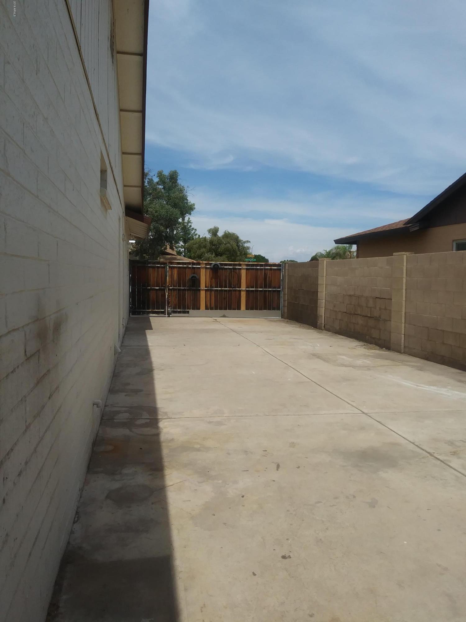 5531 West Boca Raton Road Glendale, AZ 85306 - Photo 36 of 38 RV Boat Trailer parking 50 ft X 16 Ft