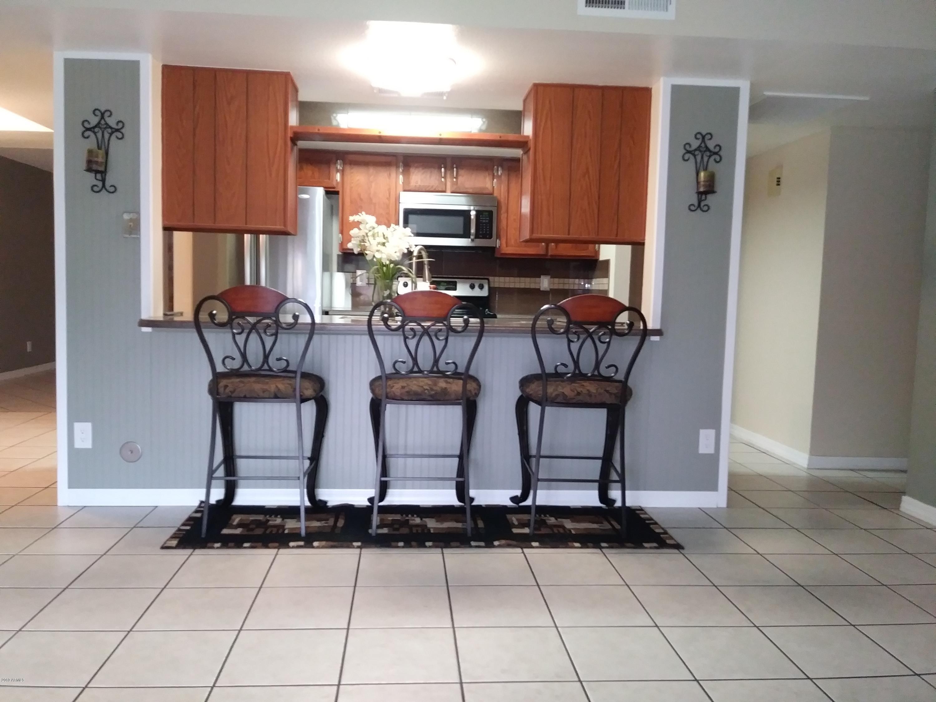 5531 West Boca Raton Road Glendale, AZ 85306 - Photo 8 of 38 Breakfast bar and cookie rolling station