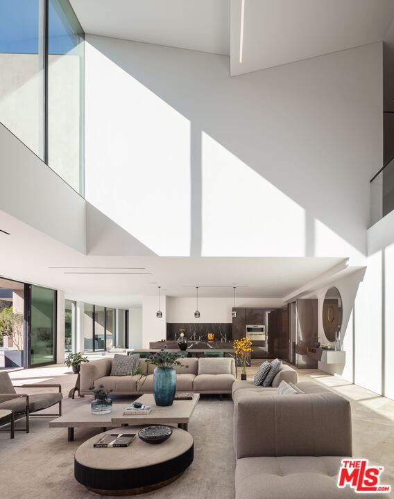 2600 Hutton Drive Beverly Hills, CA 90210 - Photo 2 of 29 a living room with furniture and a large window