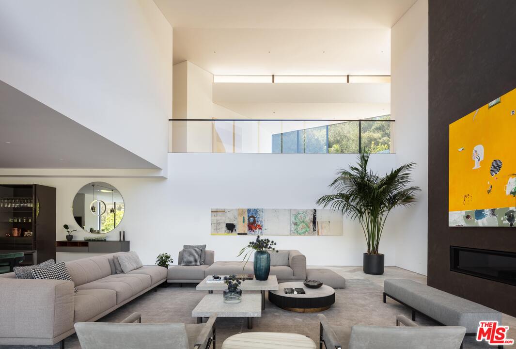 2600 Hutton Drive Beverly Hills, CA 90210 - Photo 3 of 29 a living room with furniture and a flat screen tv