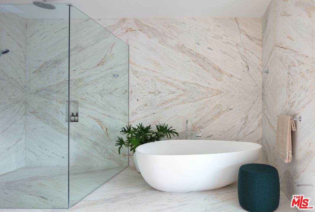 2600 Hutton Drive Beverly Hills, CA 90210 - Photo 22 of 29 a white tub sitting in a bathroom