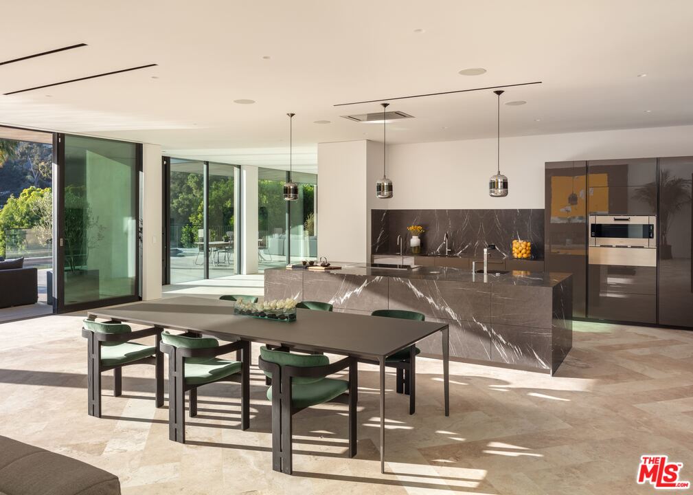 2600 Hutton Drive Beverly Hills, CA 90210 - Photo 4 of 29 a view of a dining room with furniture