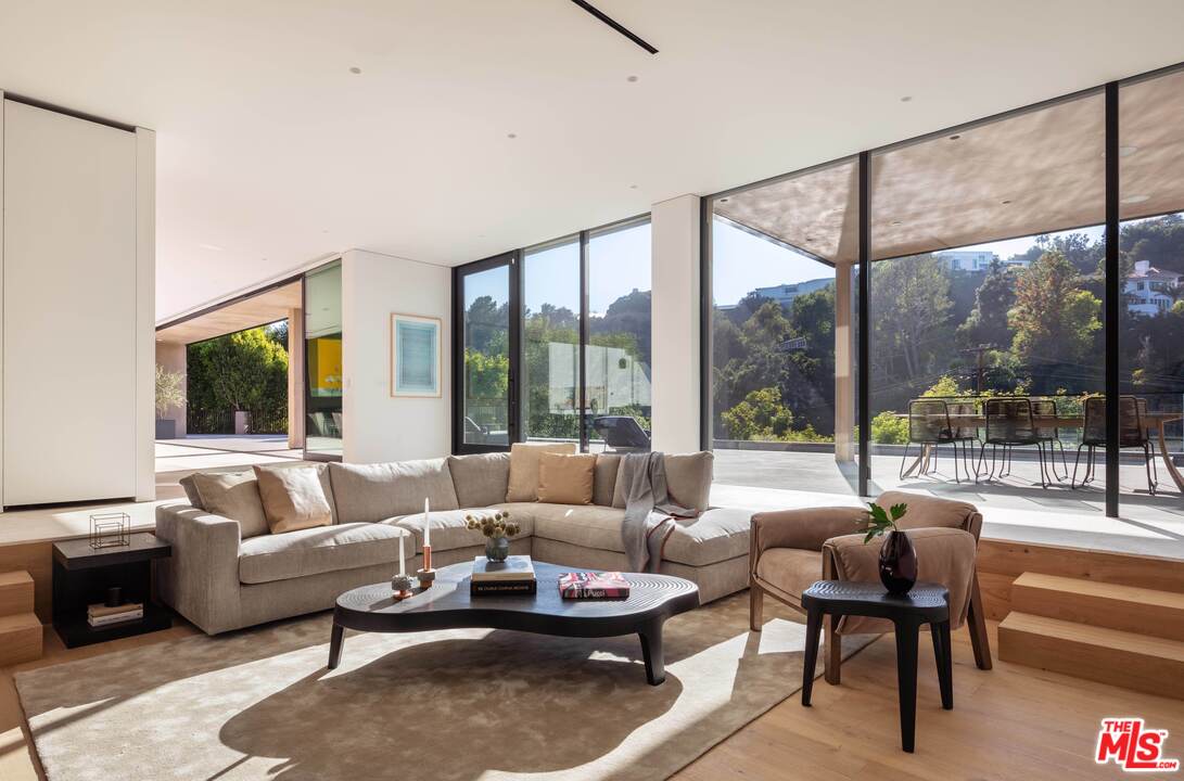 2600 Hutton Drive Beverly Hills, CA 90210 - Photo 7 of 29 a living room with furniture and a large window