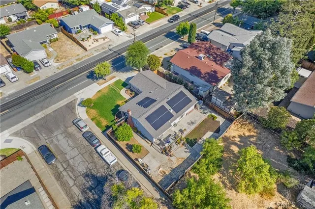 an aerial view of a house with a garden