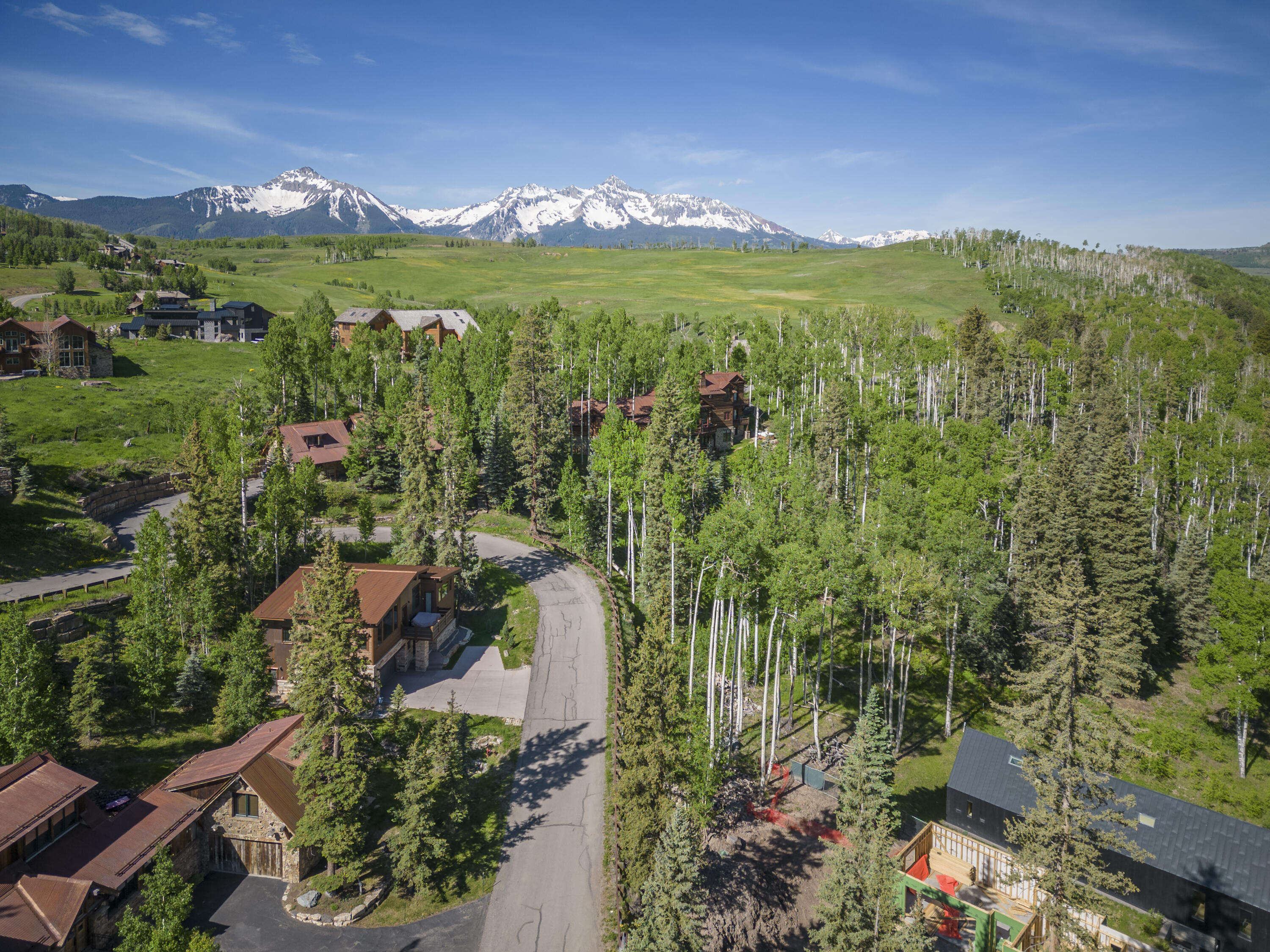 Tbd Adams Way Telluride, CO 81435 - Photo 2 of 14 a view of a city with lush green forest