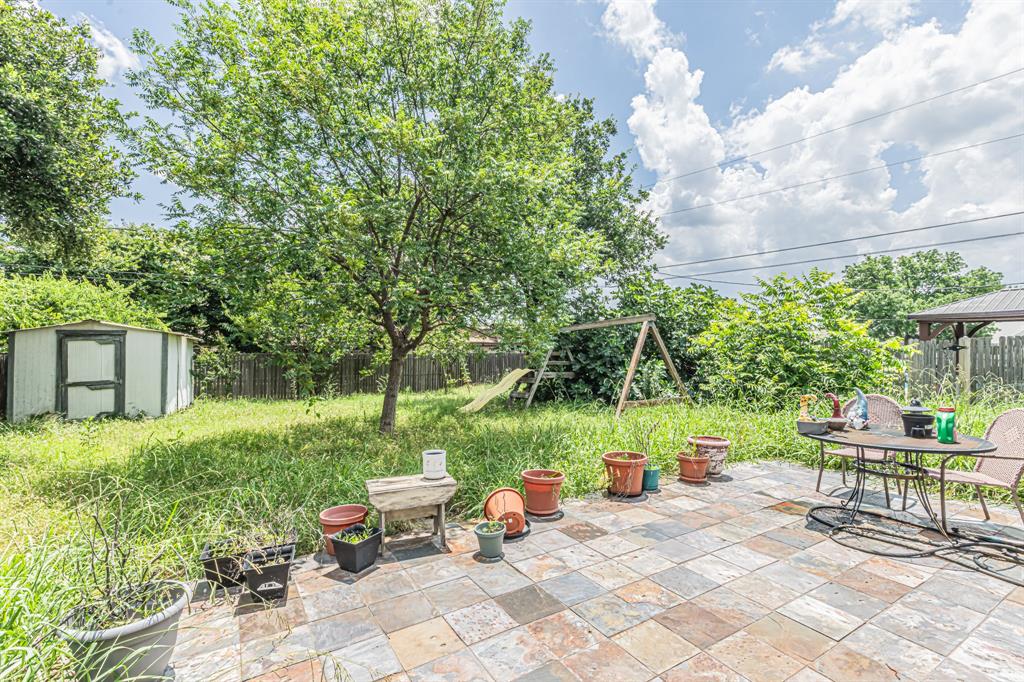 6504 Johnnie Street Watauga, TX 76148 - Photo 22 of 23 Expansive outdoor patio with multi-toned paver flooring