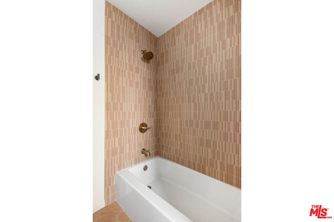 347 North Rampart Boulevard Los Angeles, CA 90026 - Photo 13 of 24 a bathroom with a bathtub and shower