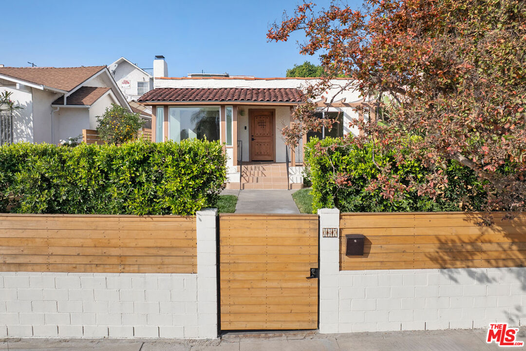 347 North Rampart Boulevard Los Angeles, CA 90026 - Photo 24 of 24 front view of a house with a small yard