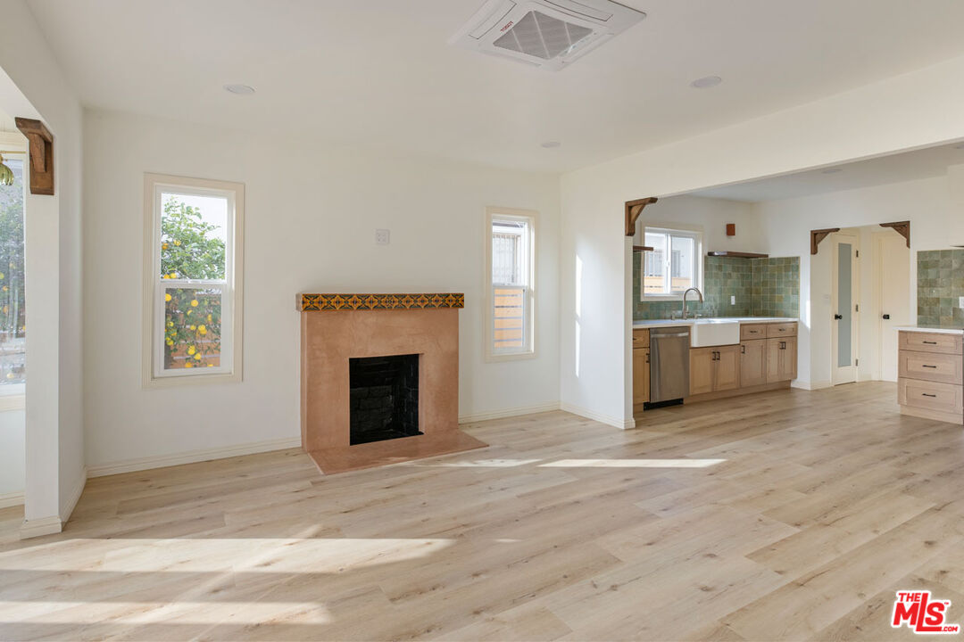 347 North Rampart Boulevard Los Angeles, CA 90026 - Photo 3 of 24 a view of a livingroom with a fireplace