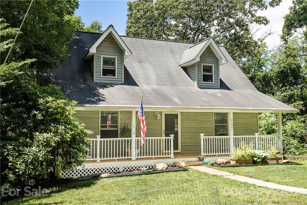 507 Vision Road Canton, NC 28716 - Photo 3 of 39 front view of a house with a yard