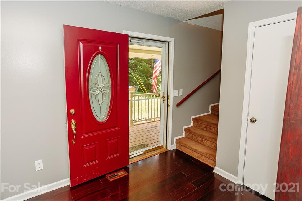 507 Vision Road Canton, NC 28716 - Photo 4 of 39 a view of entryway with wooden floor