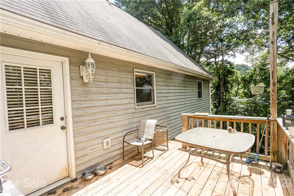 507 Vision Road Canton, NC 28716 - Photo 36 of 39 a view of a chairs and table in the balcony