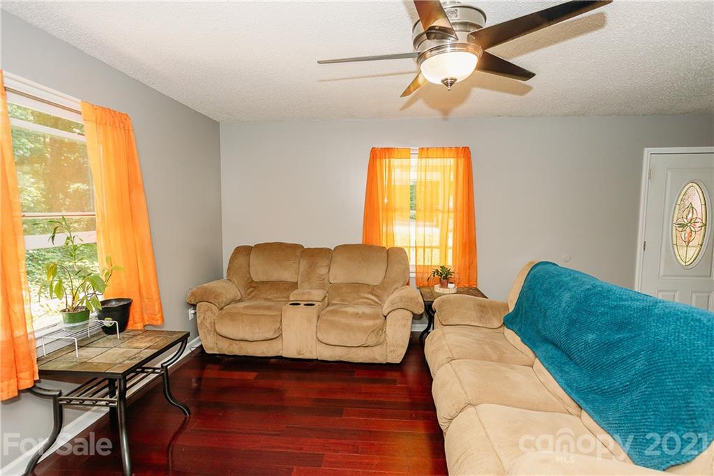 507 Vision Road Canton, NC 28716 - Photo 7 of 39 a living room with furniture and a window