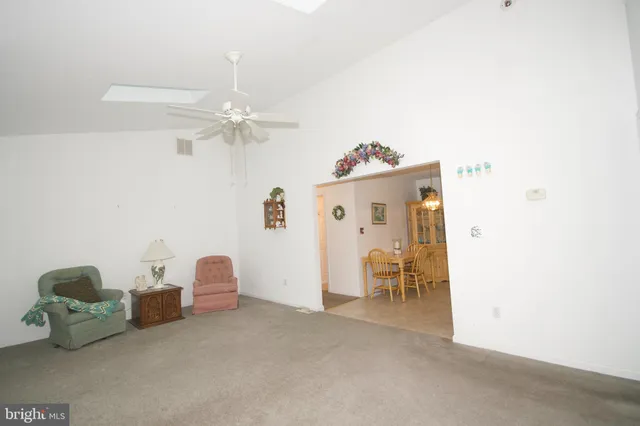 a view of livingroom with furniture and chandelier
