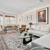 a living room with furniture and a couch