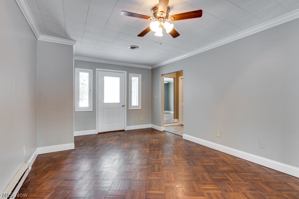 12529 Pearl Road Chardon, OH 44024 - Photo 27 of 33 Entry room - possible ensuite for adult children - parents - home office - or play room or whatever YOUR family needs....wood flooring, crown molding, access to hall bathroom....close it off by adding a barn door for some WOW .... use it as a Family Room - Pool room - Mud room - again whatever YOU need!