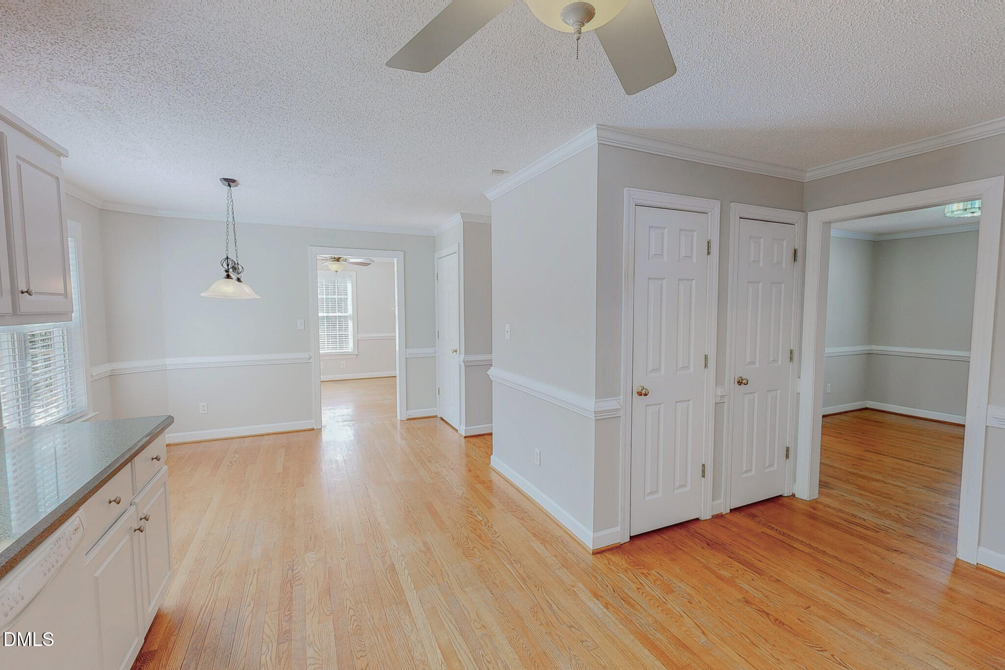 202 Equestrian Chase Rougemont, NC 27572 - Photo 14 of 54 a view of an empty room with wooden floor and a window