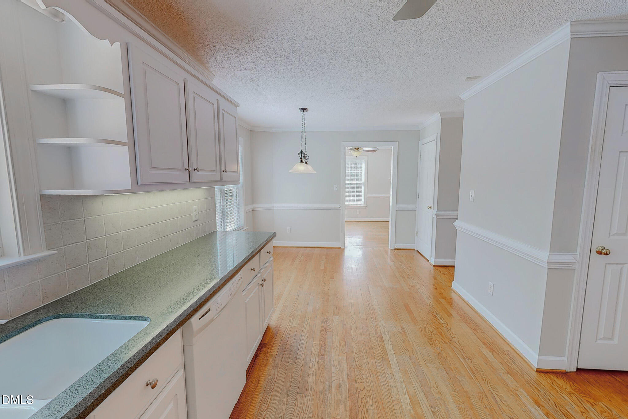 202 Equestrian Chase Rougemont, NC 27572 - Photo 21 of 54 a view of a kitchen with wooden floor and cabinets