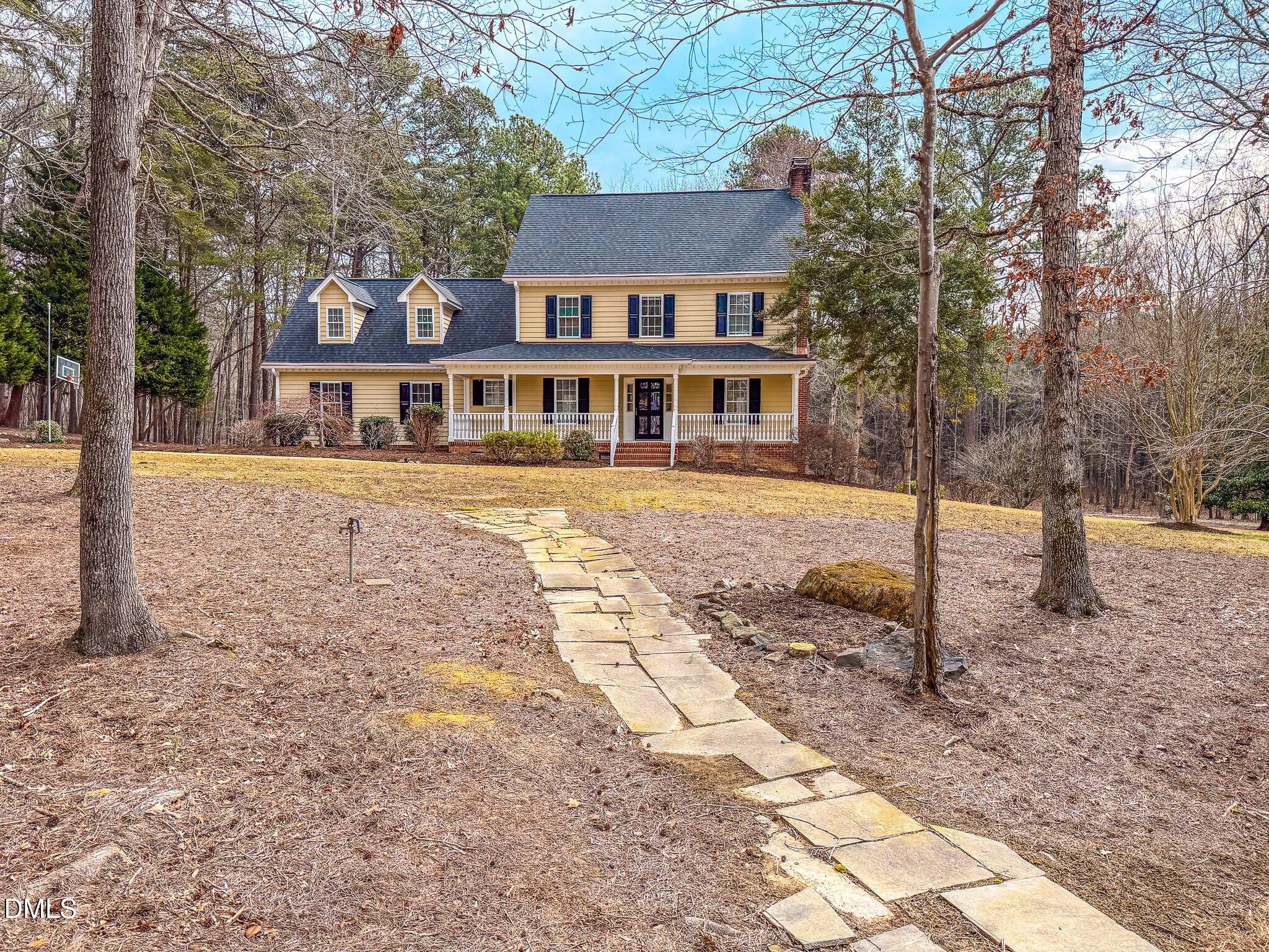 202 Equestrian Chase Rougemont, NC 27572 - Photo 23 of 54 a front view of a house with a yard