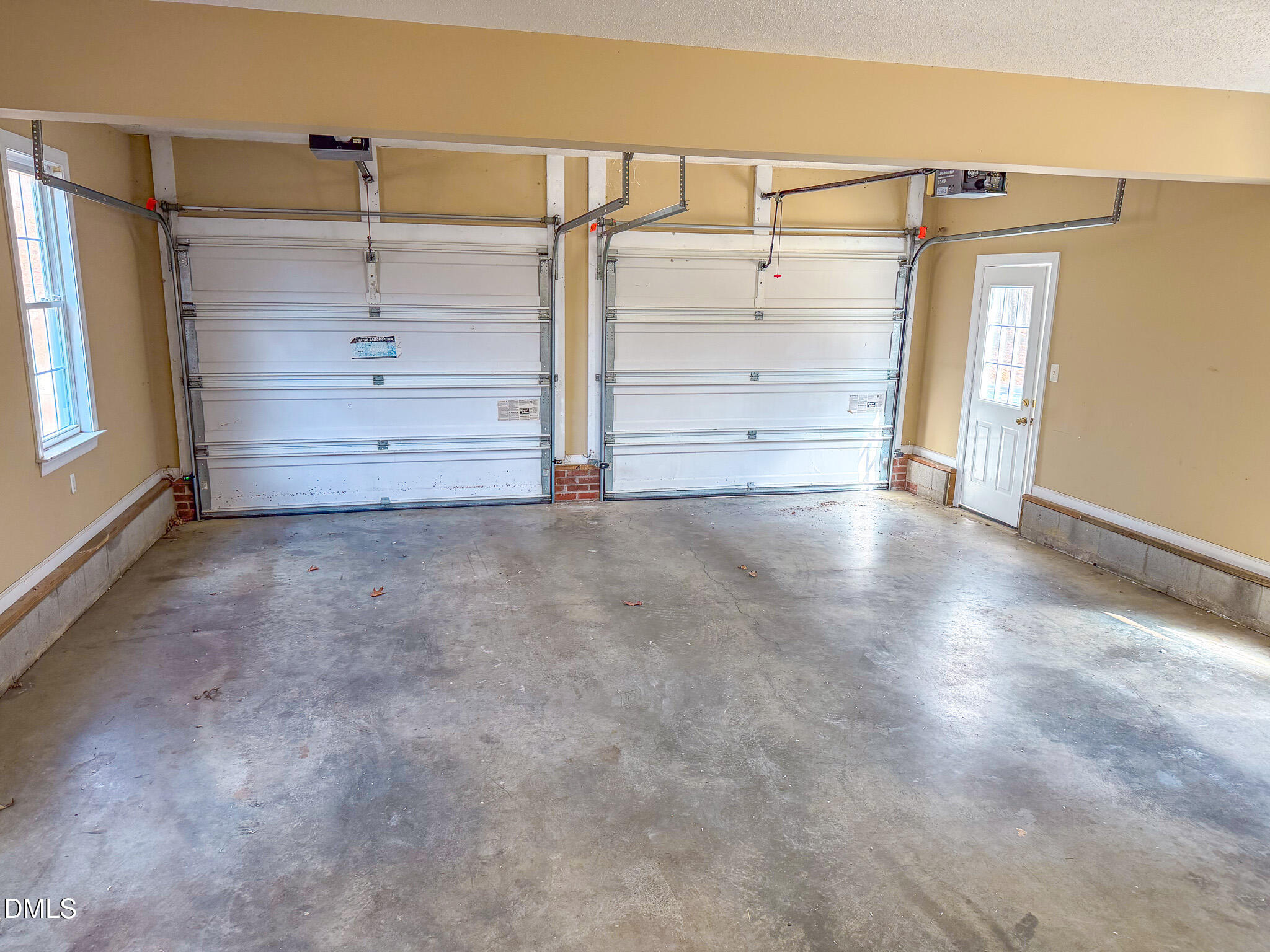 202 Equestrian Chase Rougemont, NC 27572 - Photo 26 of 54 a view of walk in closet with empty racks