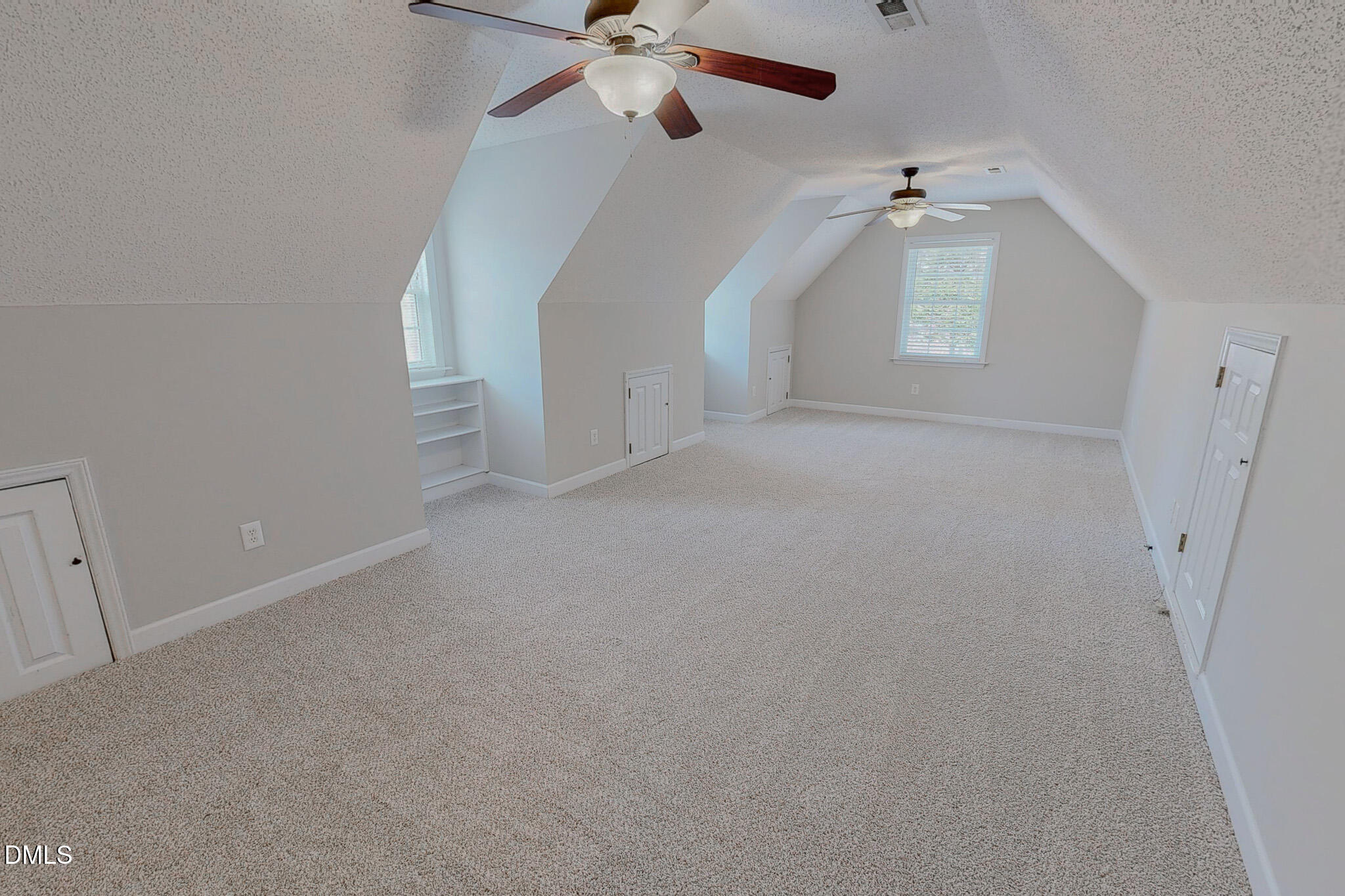 202 Equestrian Chase Rougemont, NC 27572 - Photo 40 of 54 en empty room with windows and fan