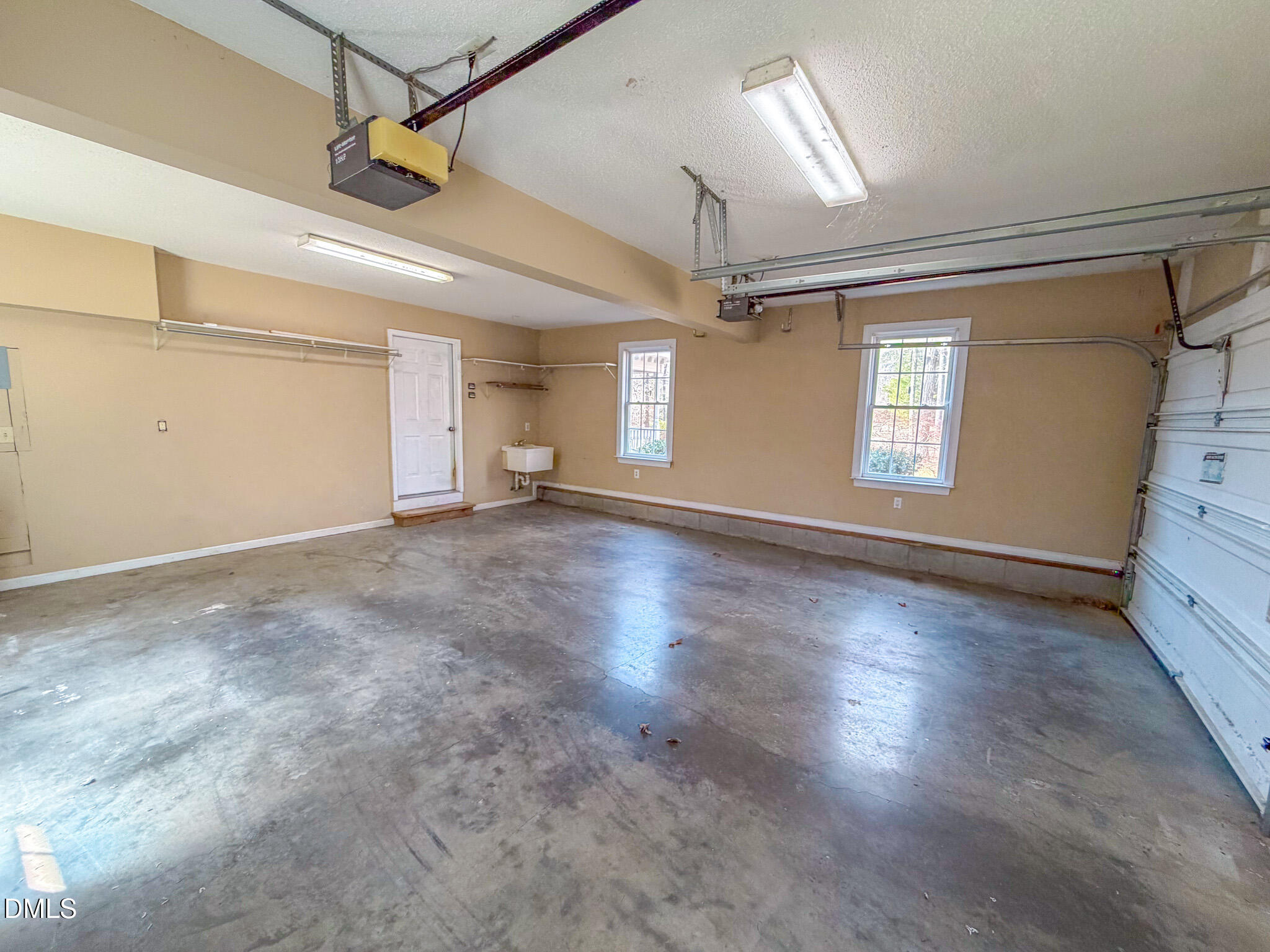 202 Equestrian Chase Rougemont, NC 27572 - Photo 45 of 54 a view of an empty room with a window and wooden floor