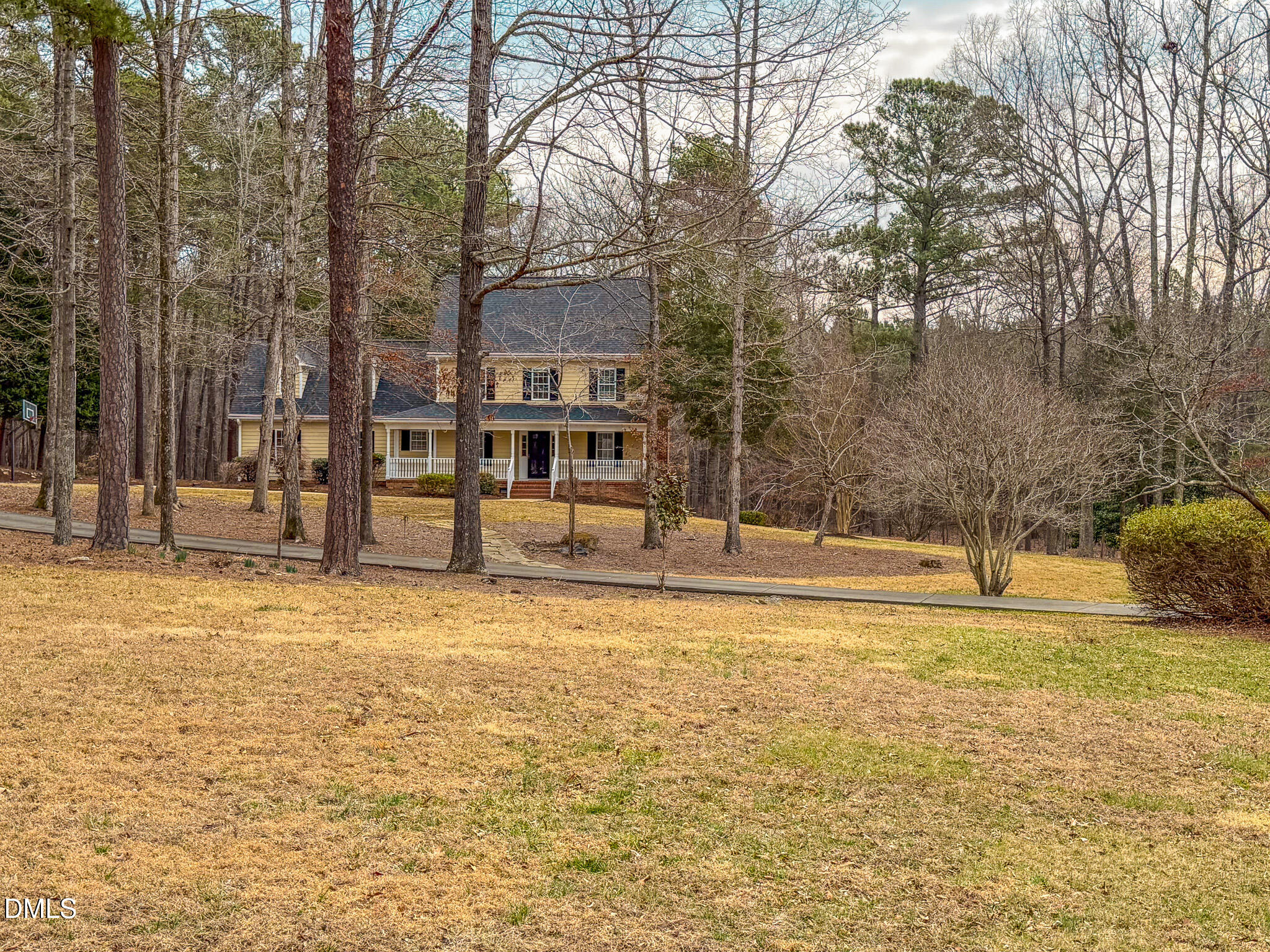 202 Equestrian Chase Rougemont, NC 27572 - Photo 47 of 54 a swimming pool with trees in front of it