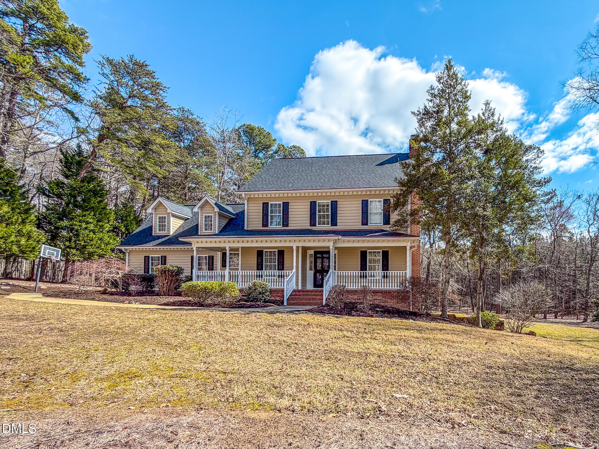 202 Equestrian Chase Rougemont, NC 27572 - Photo 54 of 54 a front view of a house with a yard and lake view