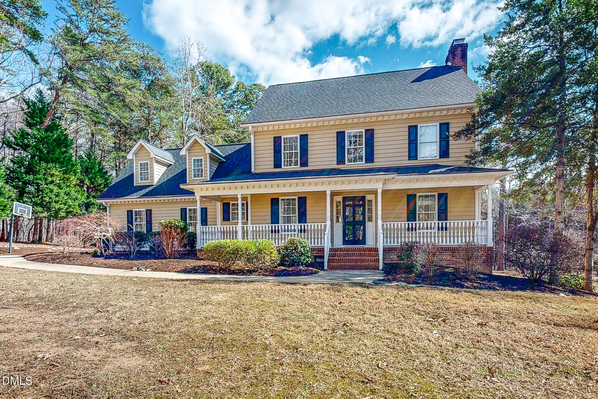 202 Equestrian Chase Rougemont, NC 27572 - Photo 8 of 54 a front view of a house with a yard